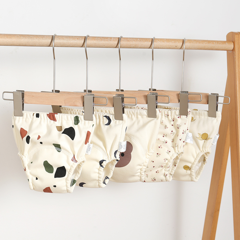 High-absorbency cotton gauze baby training pants on a hanger